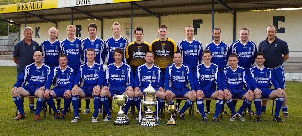 The 2009–10 Kilmore Rec squad with the season's silverware