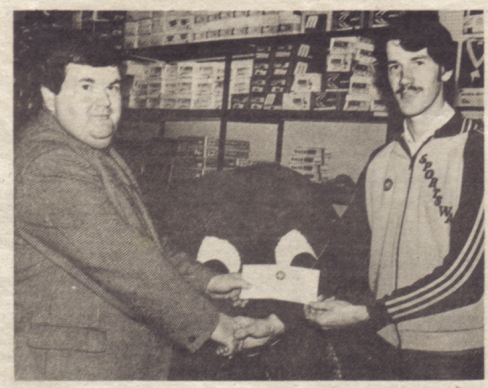 Robert Adams, "Mr Kilmore", on the left, making a presentation. The occasion is unrecorded.
