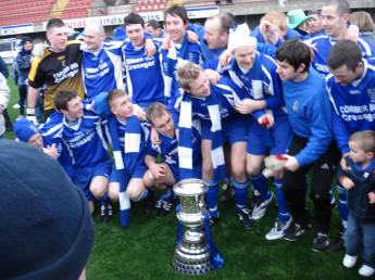 Children on the pitch among the players.