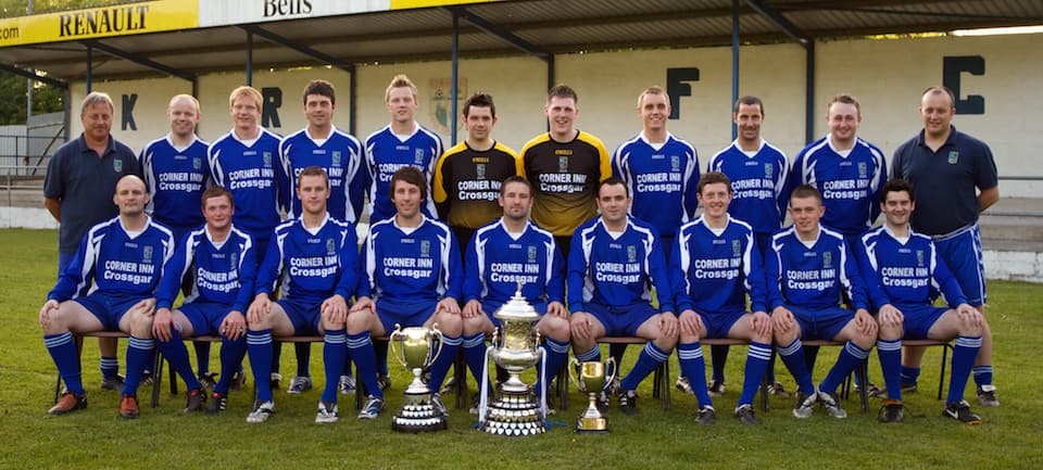 The 2009–10 Kilmore Rec squad with the season's silverware