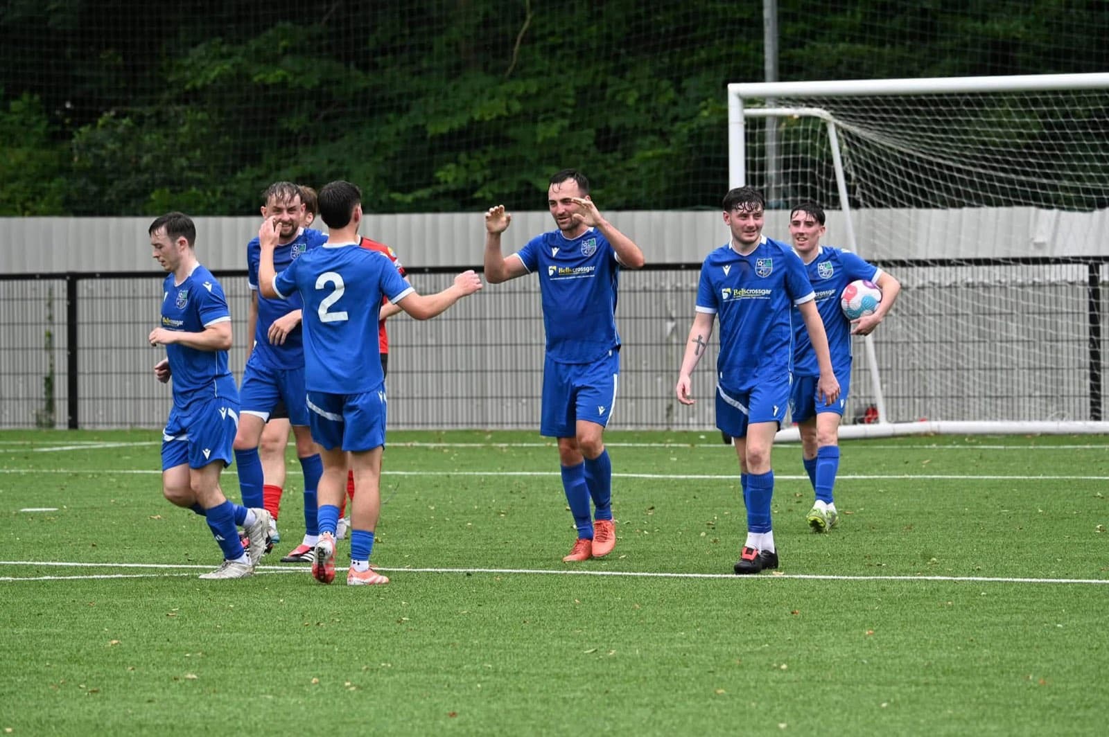 Kilmore Rec first team celebrating a goal at Robert Adams Park